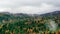 Hyperlapse of misty morning among picturesque mountains and forests. Aerial drone view of scenic autumn panoramic landscape