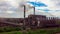 Hyperlapse. Urban landscape smoked polluted atmosphere from emissions of plants and factories, view of pipes with smoke.