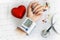 Hypertensive heart disease concept with womanâ€™s arm measuring blood pressure