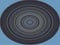 Hypnotic circle, musical plate on blue background