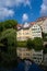 The HÃ¶lderlin Tower on the historic old town bank of the Neckar River in TÃ¼bingen