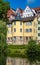 The HÃ¶lderlin Tower on the historic old town bank of the Neckar River in TÃ¼bingen