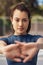 I absolutely refuse to lose. Portrait of a sporty young woman stretching her arms on a sports court.