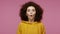 I can`t believe this! Amazed startled girl afro hairstyle in hoodie looking at camera with big eyes surprised shocked expression,