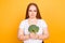 I dislike eating broccoli I prefer junk food! Portrait of unhappy upset sad frustrated woman dressed in white tshirt, she is