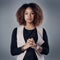 I dont compromise in my business ethics. Studio portrait of a young businesswoman posing against a gray background.