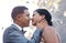 I finally get to call you my wife. Cropped shot of a young couple sharing a kiss on their wedding day.