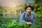 I grew this garden from the ground up. Portrait of a young man tending to the crops on a farm.