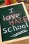 I hate school, back to school concept written on chalkboard