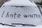 I hate winter phrase on the car window. Winter negative, concept.