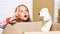 I have an idea. happy child cardboard box. happy little girl with toy. repair of room. new apartment. Cardboard boxes -