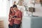 I know what we gonna cook today. Cute couple reading book together at home in the kitchen at daytime