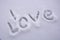 I like. Declaration of love in the snow. Snowy words of love. Text written on the surface of the snow