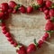 I love everything orgaic. strawberries forming a heart shape on a wooden table.