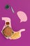 I love fast food. French fries in the form of is stomach isolated on pink background