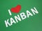 i love kanban, software scrum agile board with paper tasks, closeup