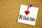 I love my Blogging written on white signboard pinned to a cork notice board