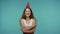 I love myself! Optimistic girl in summer dress and funny party cone on head laughing carefree	 embracing herself
