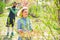 I love our moments in the countryside. Couple in the farm on countryside background. Happy Couple Farmers working with