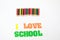 I love school , School supplies colored pencils in a row, isolated