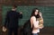 I love to study. Woman student look in glasses with book stack and backpack with teacher man writing on chalkboard at