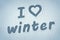 `I love winter` written on the snow