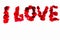 I love - words made of red rose petals. Beautiful romantic backgrounds