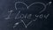 I love you. Handwritten chalk on a black chalkboard. Arrow shot heart shape. Love at school concept.