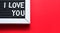 I love you in white letters on a framed blackboard. Whiteboard for entries and tags. Valentine`s Day, a declaration of love, a