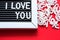 I love you in white letters on a framed blackboard. Whiteboard for entries and tags. Valentine`s Day, a declaration of love, a