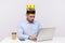 I`m boss! Ambitious arrogant top manager, office employee with crown on head working on laptop and frowning