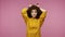 I`m rabbit! Adorable carefree girl afro hairstyle in hoodie standing with bunny ears gesture on head and making cute face, having