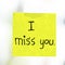 I miss you word on sticky note