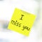 I miss you word on sticky note