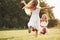 I missed you so much. Mother and daughter enjoying weekend together by walking outdoors in the field. Beautiful nature