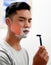 I really need to replace this. Shot of a young man at home getting razor burn on his face from shaving with a disposable