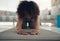 I need to stretch my back. Defocused shot of a young woman practising yoga in her living room.