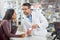 I think youre suffering from a lack of vitamin me. a male pharmacist assisting a customer at the prescription counter