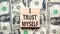 I trust myself symbol. Concept words I trust myself on wooden blocks. Dollar bills. Beautiful background from dollar bills.