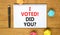 I voted. Did you symbol. Concept words I voted. Did you on beautiful white note. Beautiful wooden table background. Colored paper