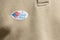 I Voted by Mail paper sticker on shirt to illustrate voting by mail in election