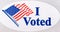 A I voted sticker with American flag on white background