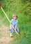 I want to find treasures. Little boy with shovel looking for treasures. Happy childhood. Adventure hunting for treasures