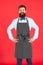 I will cook for you. Bearded man cook smiling in apron. Confident master cook with beard and moustache wearing bib apron