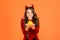 I witch you Happy Halloween. Happy child hold pumpkin orange background. Little child with party look celebrate