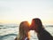 I wouldnt want to spend my life with anyone else. an affectionate young couple kissing on the beach at sunset against a
