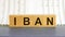 Iban text on wooden table for your desing, concept. iban the international bank account number