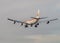 Iberia jet airliner approach to land at Madrid airport runway, seen from behind