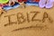 Ibiza beach holiday sand word writing