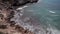 Ibiza cliffs, Horizontal panning and panoramic views of an ibiza beach in summer
